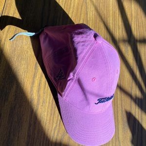 Pink titlist hat. Brand new. Never worn